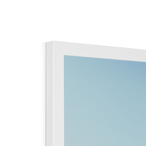 A window sitting in front of a white monitor in a tall window.