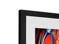 some photographs are in a picture frame on top of a flat panel on a black background