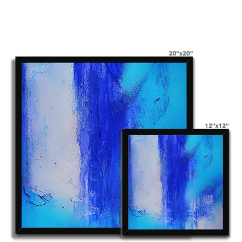 An abstract painting sitting on a ceramic tile set next to three flat screen monitors.