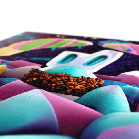 A set of pillows covered in colorful print on a table.