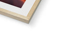 A picture of an abstract image on a wood framed book shelf with a picture of a