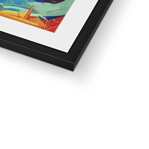 A framed picture of an art image sitting on top of several picture frames.