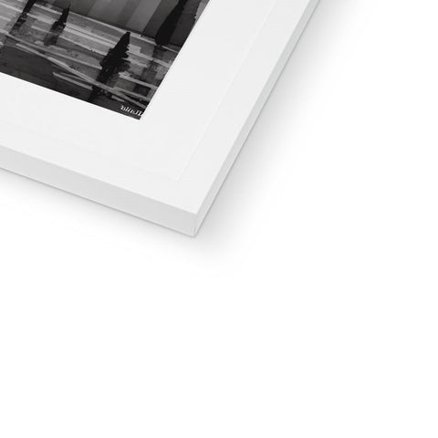 A white photo with a close up of a polaroid photo in a framed frame on