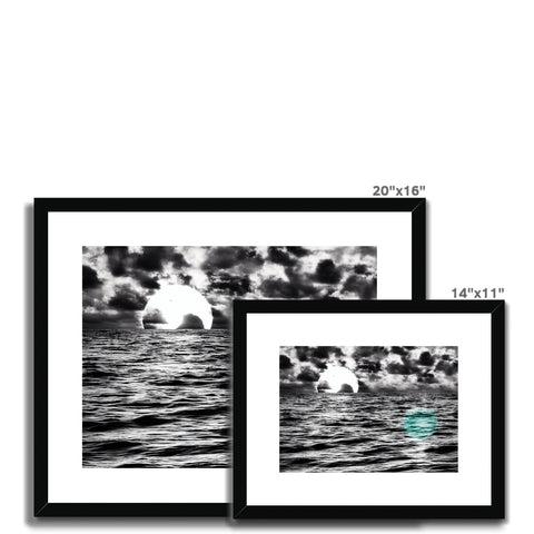 A framed photo of three photos on white canvas and each taken in black and white on