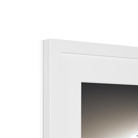 A white picture frame standing in a frame next to a window.