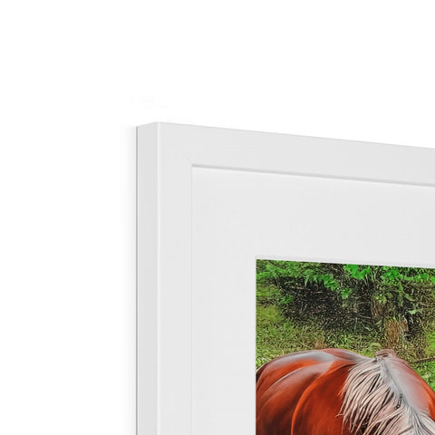 a picture frame with a horse in it on a white background on a desk