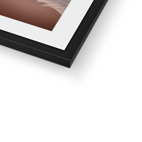 A photo of a white photo is on a piece of frame.