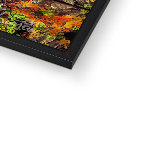A black picture frame frame with a picture of flowers in a photo frame.