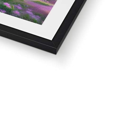 An image of a flower on a picture frame sitting on a table.