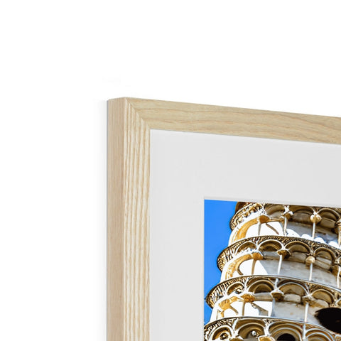 A wooden cage with two pictures sitting on top of it in a blue frame with a