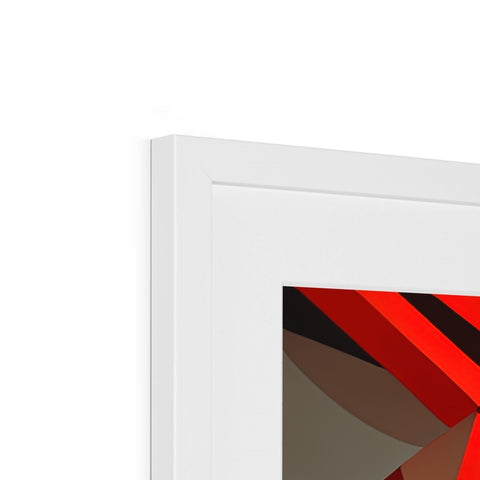 A red triangle above a mirror on a box with white framed prints on it.