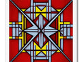 An abstract design of a cross hanging hanging with a yellow border and a red wall.