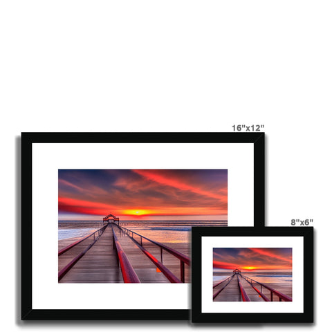 Three pictures on a picture frame framed in white on a wall with white background color and