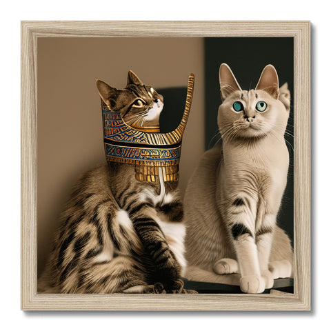 A couple of cats standing beneath a very close up portrait of a pyramids stone.