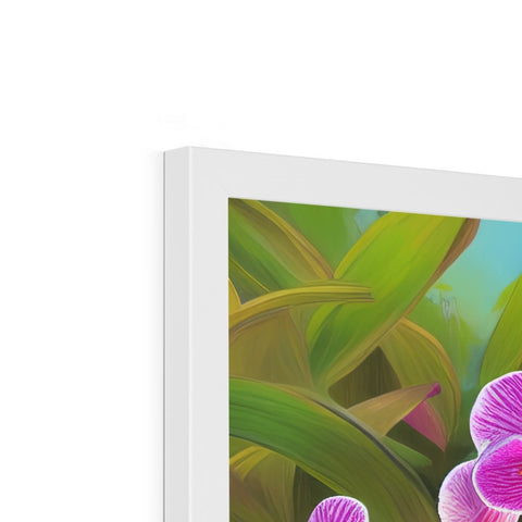 A table with a large colorful picture frame looking at a beautiful tropical flower.