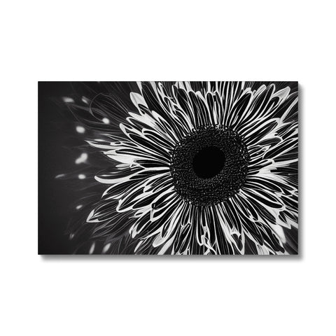 An abstract image of a flower in an  art print on a table near a picture