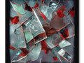 a metal framed window pane with broken glass, a broken glass case and shattered glass
