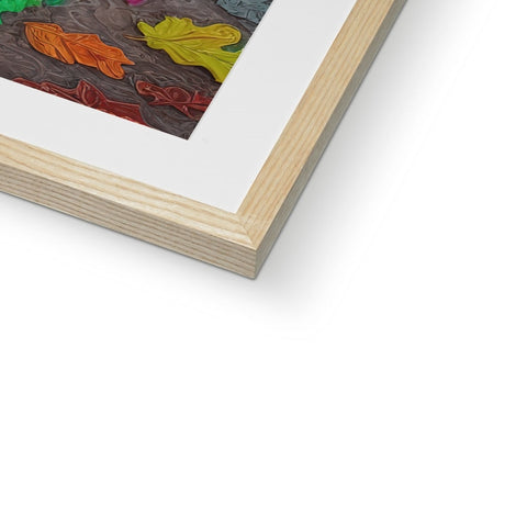 A print of artwork that is on a wooden frame standing against some wood.