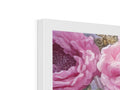 A picture frame decorated in pink flowers is decorated with a picture of peony flower.