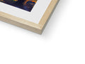An art print is on top of an easel with a white background.