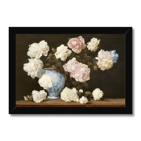 A vase filled with pink roses on a white wall under an art print.