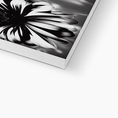 A large framed picture of a flower on a book cover.