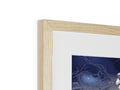 A picture of a black and white wooden frame filled with beautiful artwork.