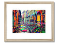 An art print sits next to a water filled street during a heavy rain event.