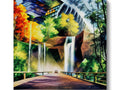 A colorful wall mural hanging next to mountains hanging around a waterfall.