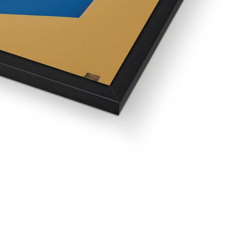 a small white picture frame with a blue, black and yellow device on it