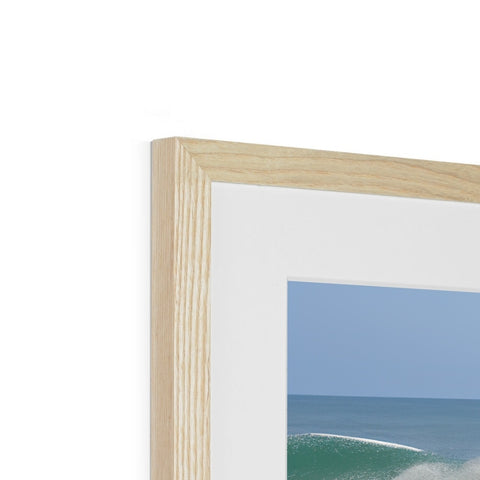 A picture frame with wood framed on wooden frame with a photograph on it.