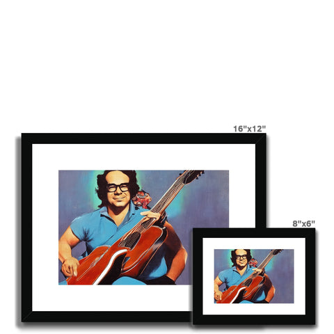 a white picture with blue framed picture and white prints and a red photo