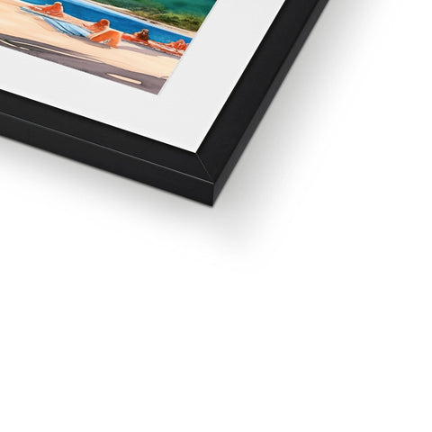 A picture of pictures hanging on a framed frame with a hanging object.