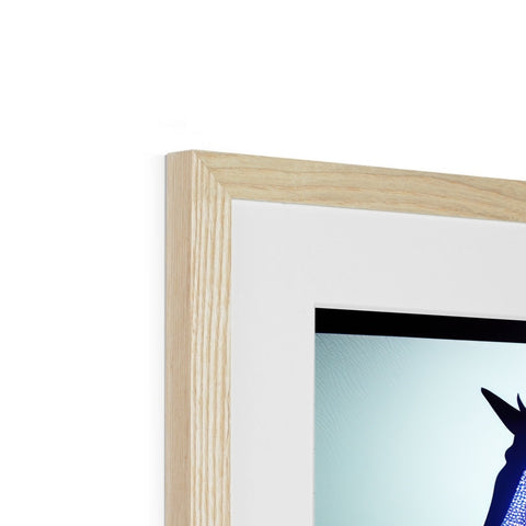 A wooden frame with a picture of a blue bird sitting on top of the frame.