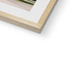 A photo of a white photo on a box in a frame of wood.