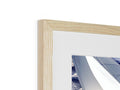 A picture frame with a white photo on it on a white background.