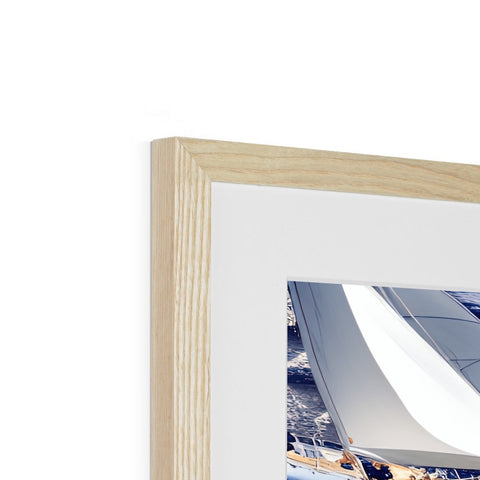 A picture frame with a white photo on it on a white background.