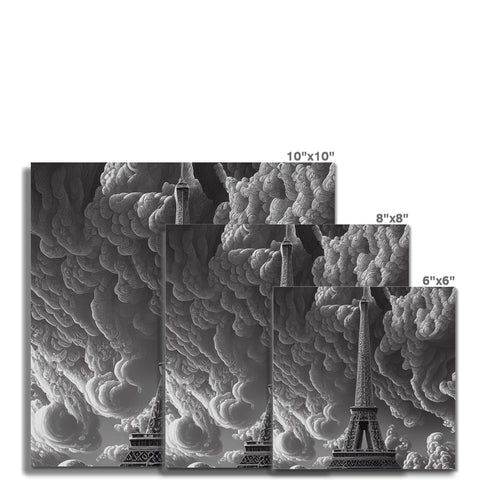 Black and white picture of buildings that are in smoke.