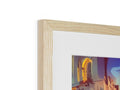 Picture frame with wooden photograph framed in it on top of a table of wood