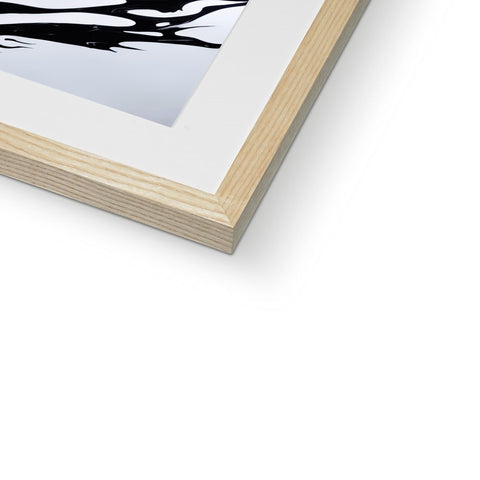 A photo of a black and white painting on a softcover photo frame.