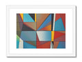 A colorful and geometric art print on a white wall on a wooden platform.