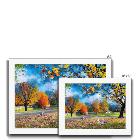 A greeting card with two pictures of Autumn trees, a bird, a car, and