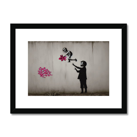 An art print printed on a wall of flowers with a yellow person playing with it.