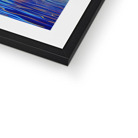 A blue photo is displayed on a metal frame with an art print on it.