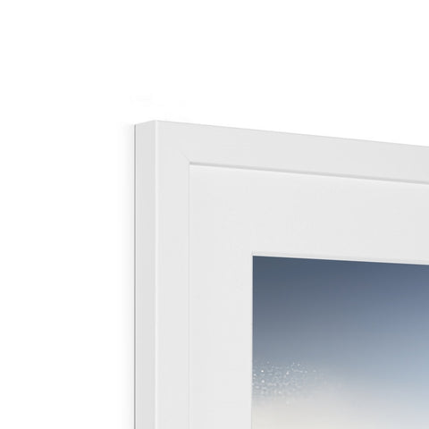 an imac photo frame with white paper that is in the background of a window.