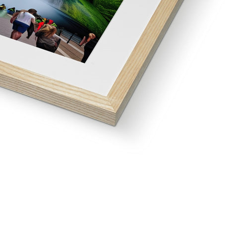 A wood image of a photo on a wall is set into a frame.