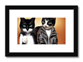 2 cats standing against a black photo background on a wooden frame.