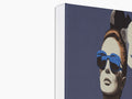 A hardcover book with black pages featuring a photo of a person with his favorite sunglasses
