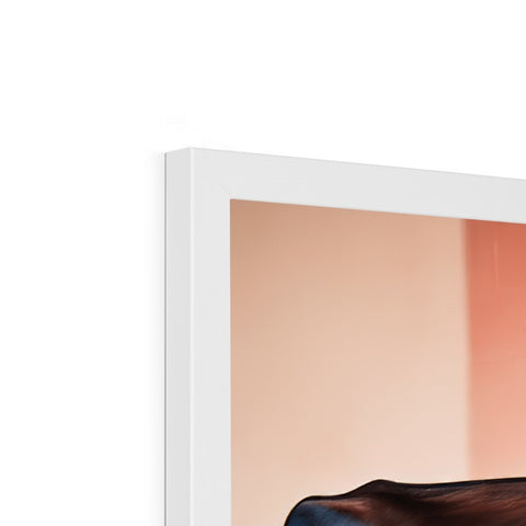 A head board is displaying an imac TV in the background on a brown chair.