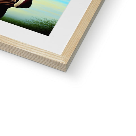 A wooden frame of a photo on top of a book cover.